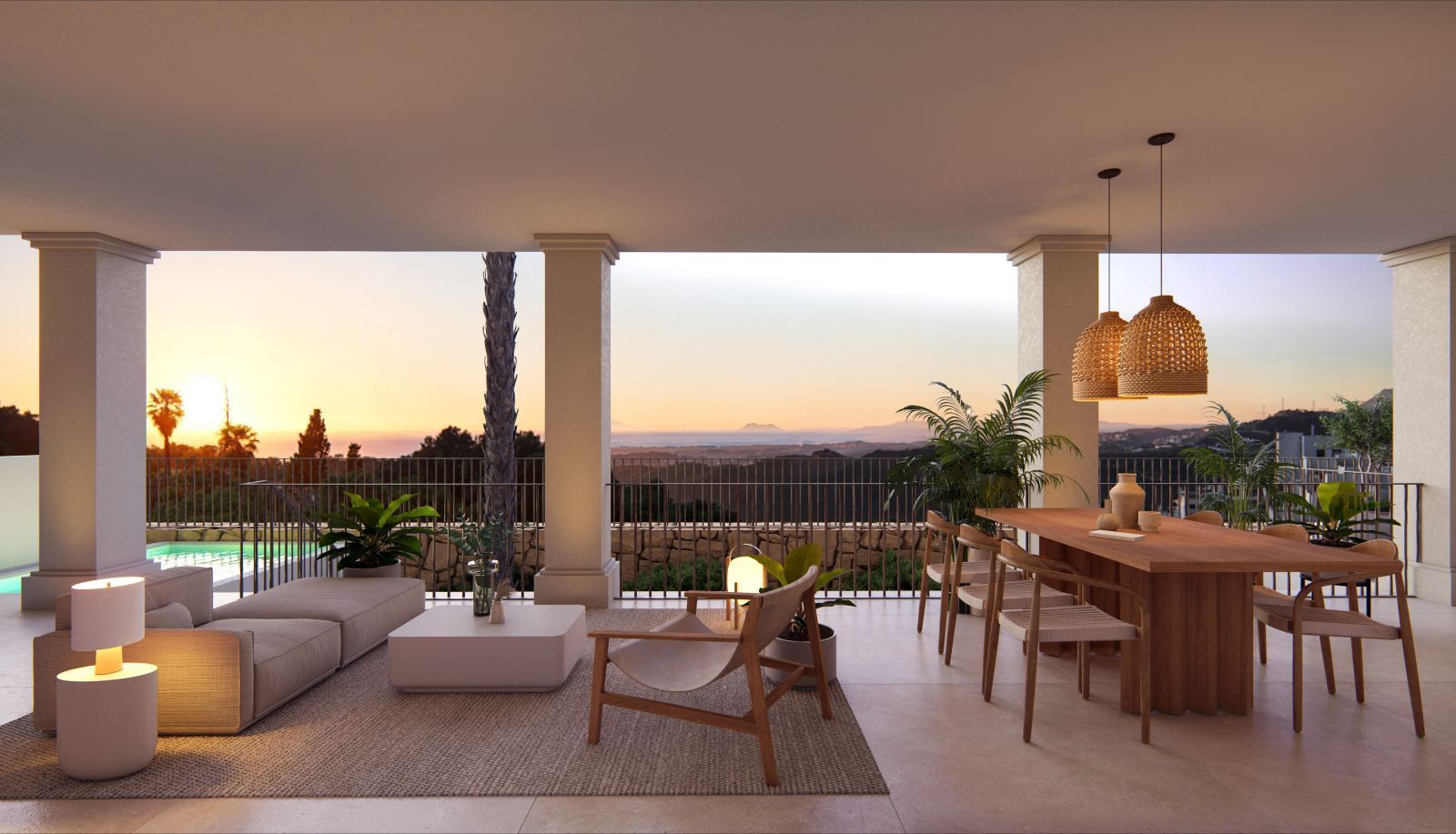 Espace de vie extérieur avec vue sur le coucher de soleil aux Résidences The Views.