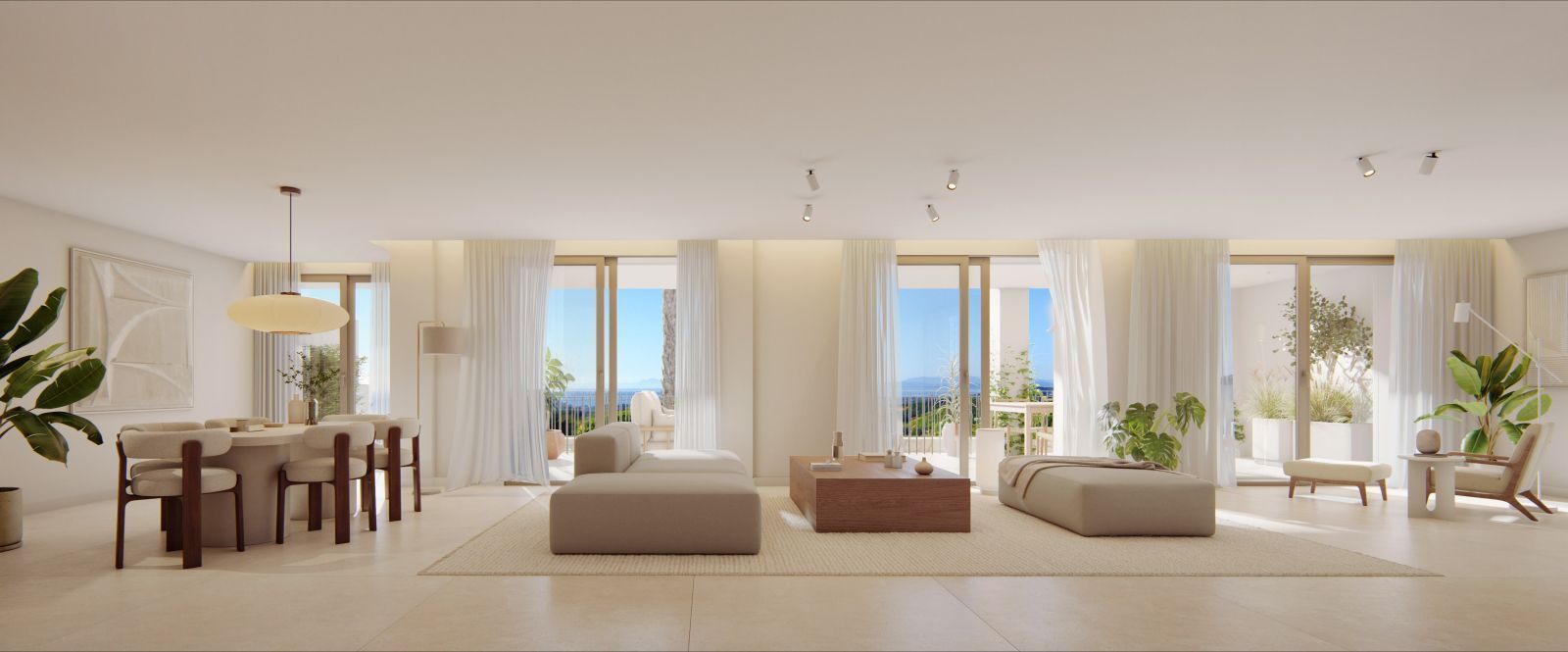 Salon et salle à manger lumineux dans The Views Residences, avec vue sur la mer.
